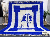 Ghazal – tapis berbère beni ourain bleu et blanc à bordure 254x293