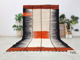 Landa - Tapis berbère 200x325 noir et orange - Tapis Zanafi rayé kilim