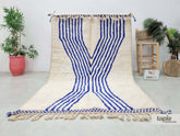 Taiba - Tapis berbère 170x240 bleu et blanc - Tapis Beni Ouarain rayé